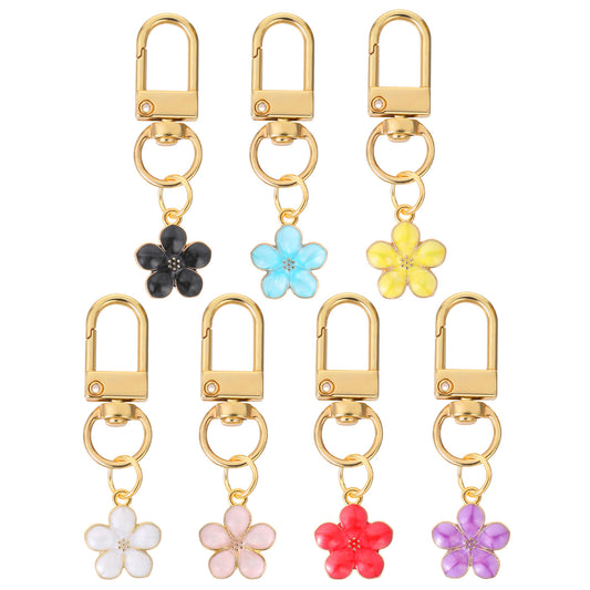oruola 7 pcs Flower Keychain, Aesthetic Keychain Charms for Women,Cute Flower Keychains With Backpacks Earphone Case Decoration Accessoriess and Bag Charms for Womens Handbags 7 Colors